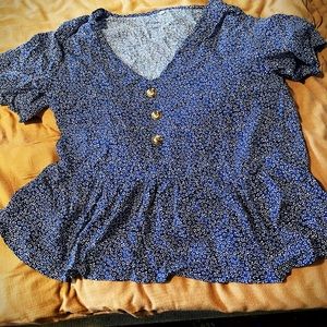 Women’s SHEIN blue top with white floral design